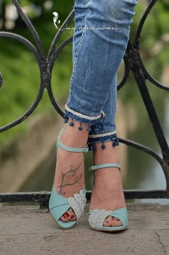 Handcrafted light-blue sandals with jeans, La Gatta con gli Stivali campaign, footwear