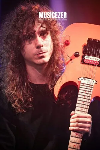 Guitarist with an electric guitar, Musicezer campaign, online music lessons