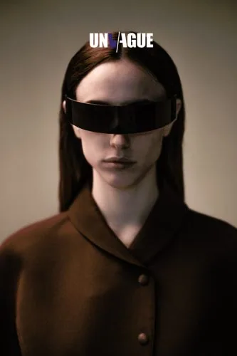 Model wearing a dark visor, Unvague campaign, fashion